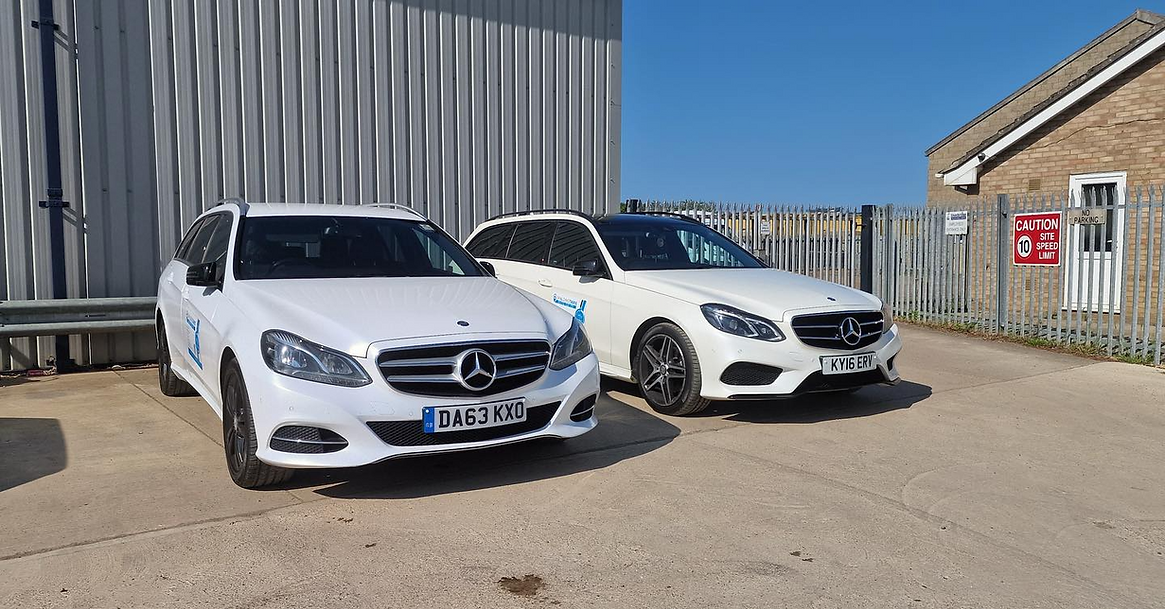 two Spalding taxis side by side