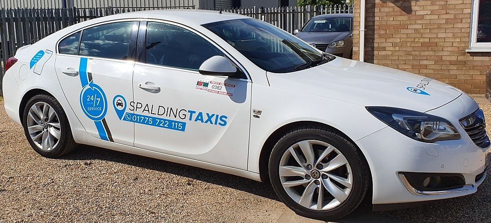 smart white luxury Spalding taxis vehicle