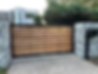 Large wooden gate with automation