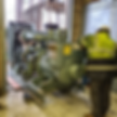 Worker testing a large generator