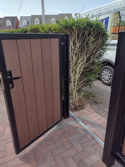 Composite manual pedestrian gates in Glasgow Scotland by CM Gates & Barriers