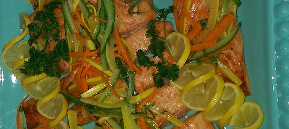 Seafood salmon and julianne vegetables prepared dish from The Meating Place