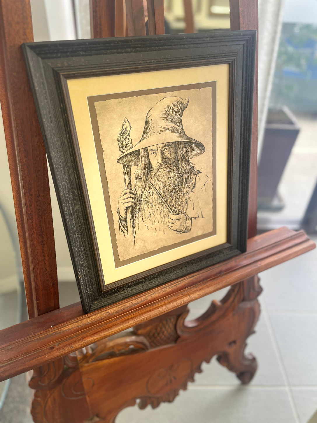 Various custom-framed items including artwork, puzzles, and 3D objects, available through Singleton Framing Gallery with framing done at Maitland Framing Gallery