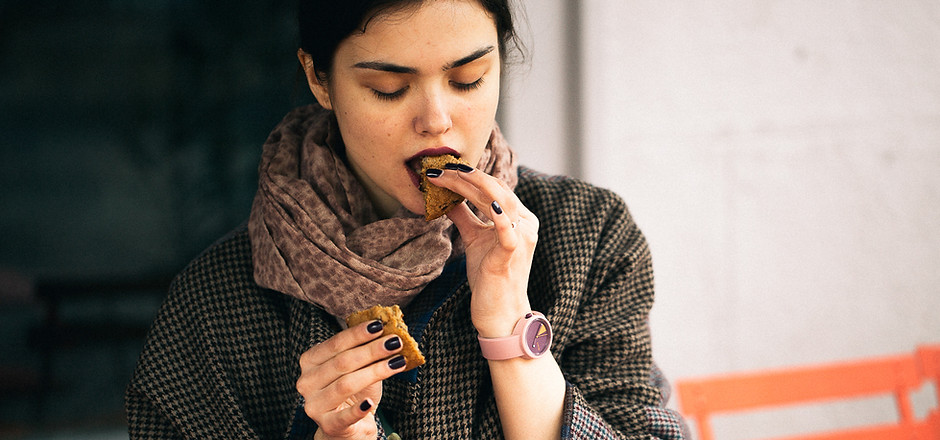 Woman Eating Cookie