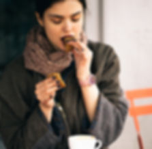 Woman Eating Cookie