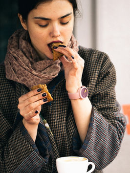 Woman Eating Cookie