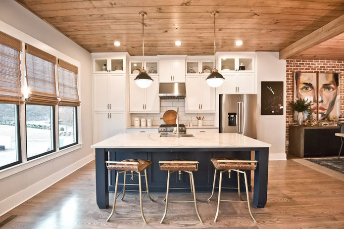 A new industrial-style townhouse development in the urban West Side of Atlanta combines modern design with raw, urban character. Featuring exposed brick facades, metal accents, and large factory-style windows, these townhomes blend contemporary finishes with industrial charm. Open-concept layouts maximize space and natural light, highlighting polished concrete floors, steel beams, and high ceilings for a loft-like feel. Sleek kitchens, modern appliances, and flexible living areas offer both style and functionality, while private patios or rooftop decks bring outdoor living into the cityscape. Situated in a vibrant neighborhood with easy access to shops, dining, and transit, this development provides a dynamic urban lifestyle that’s both modern and distinctly Atlanta.