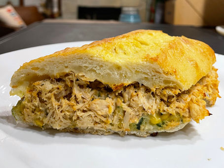 Indulge in the bold flavors of this Street Corn Chicken Sandwich, where tender, slow-cooked chicken meets the smoky-sweet notes of classic street corn. The juicy chicken, infused with subtle spices, is layered on a toasted ciabatta roll, offering a satisfying crunch that complements its hearty filling. A slice of pepper jack cheese melts over the chicken, adding a kick of heat that’s perfectly balanced by the creamy corn salsa, bright cilantro, and a squeeze of lime.