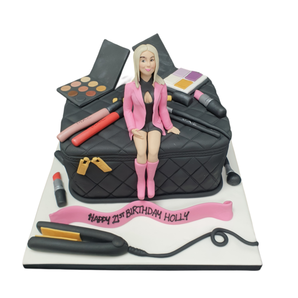 Bespoke make-up bag cake with a lady figure, detailed decorations, crafted in Solihull, West Midlands celebration.