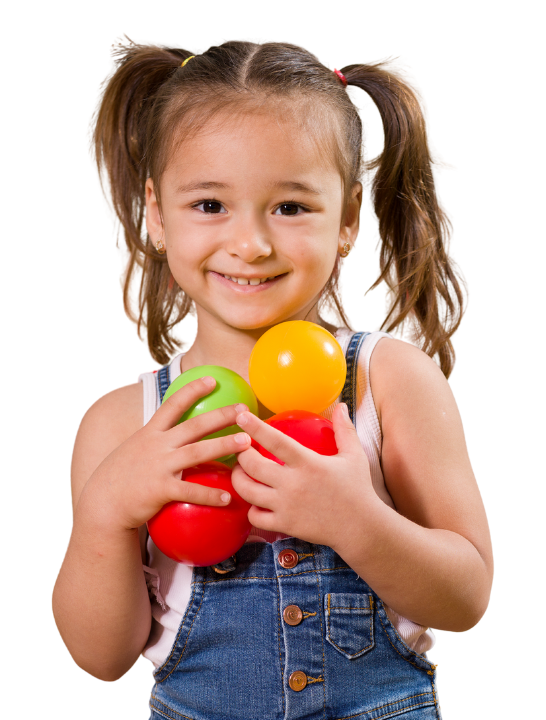 Smiling toddler at Butterfly Learning Centre daycare in Port Moody holding colorful toys