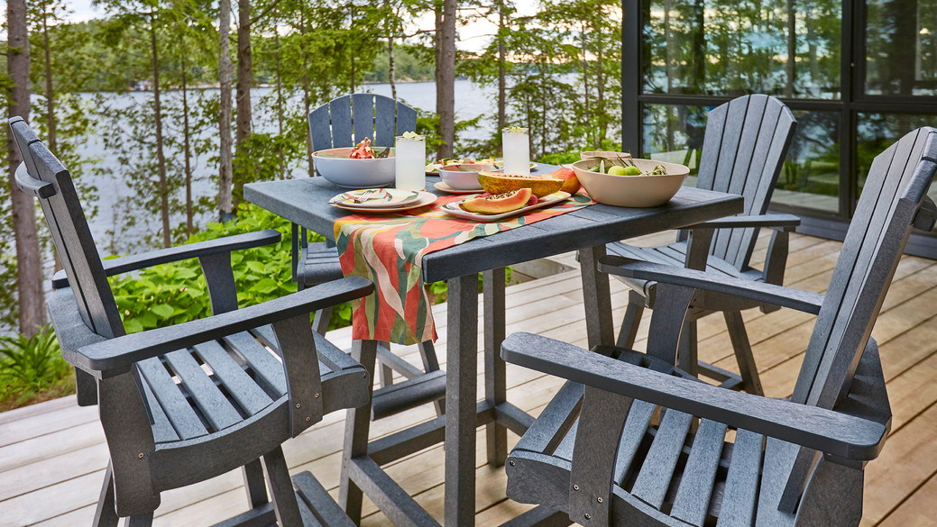 Dining set on a deck overlooking lake