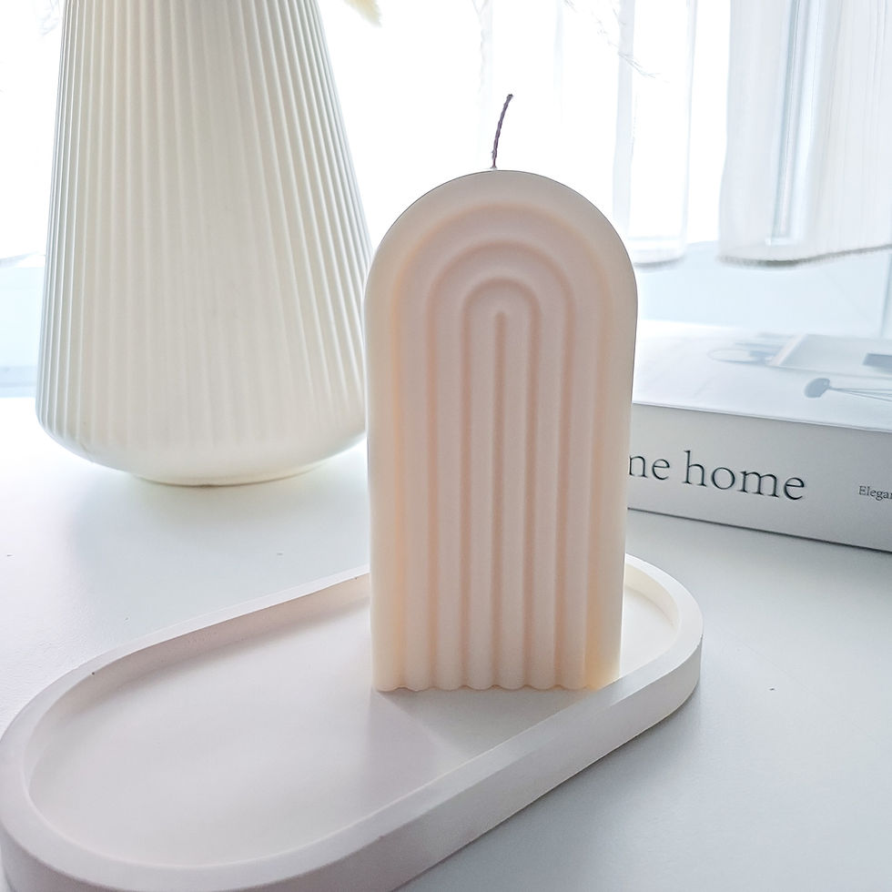 Thumbnail: A handmade Rainbow Candle with a minimalist arch design, crafted from natural rapeseed wax, displayed on a light decor settin
