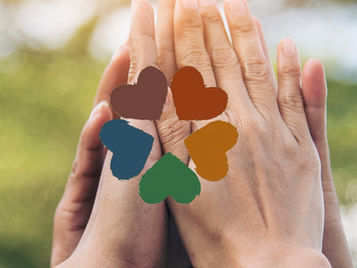 Hands touching in the air with Federation for Children with Special Needs log on top