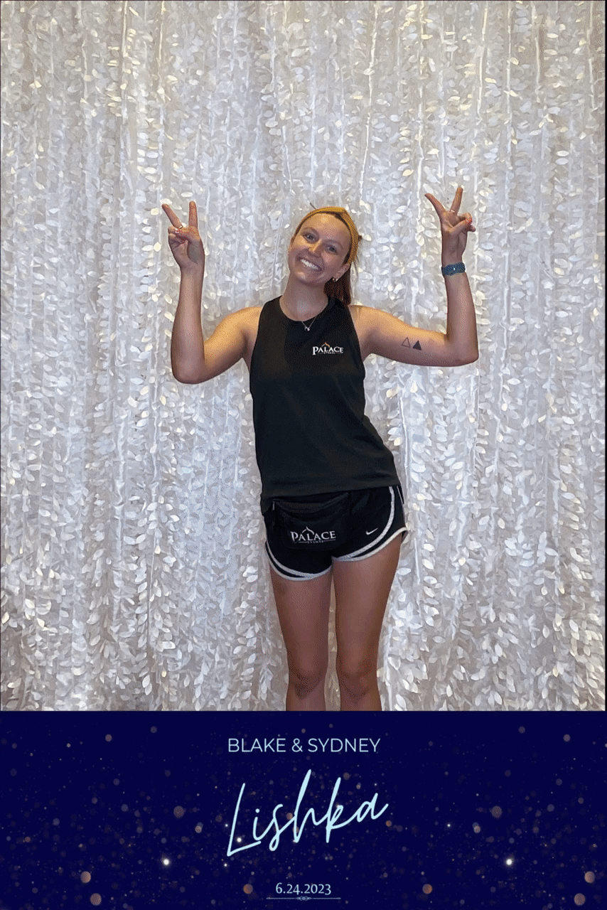 GIF Photo Booth with White Petal Taffeta Backdrop