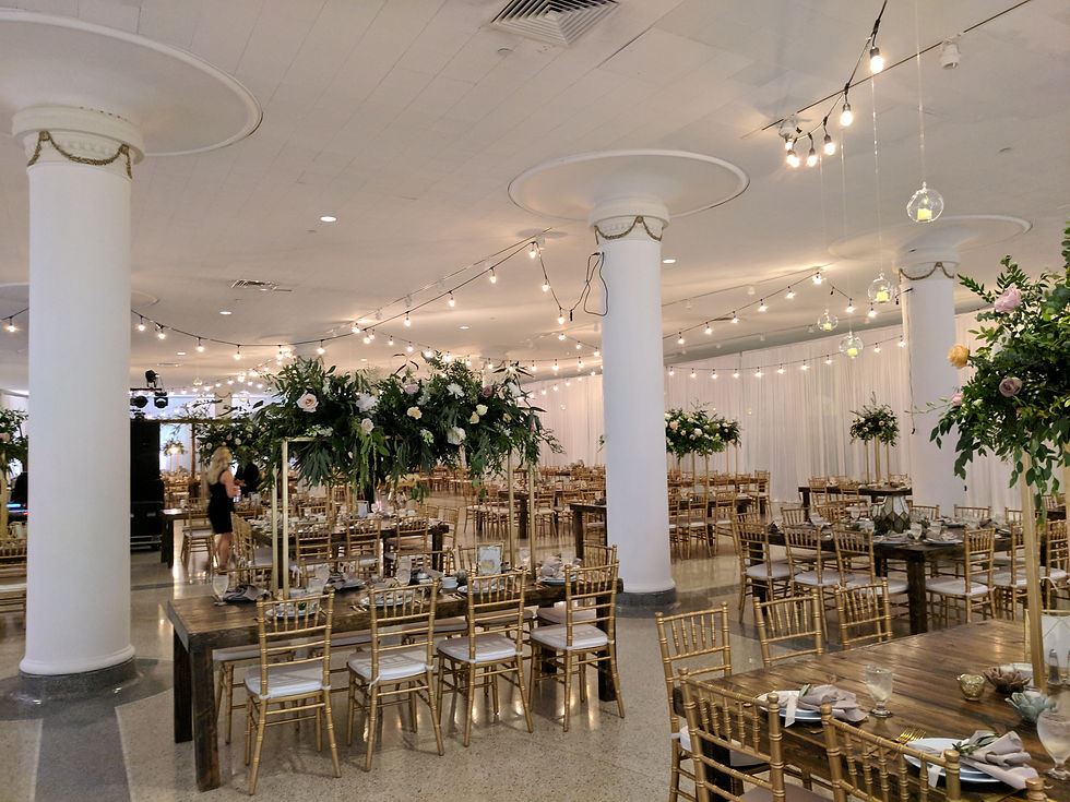 Indoor Wedding Reception with Harvest Tables and Chiavari Chairs