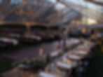 Outdoor Clearspan Tent Wedding Reception with Bulb Lighting and Wooden Chandeliers