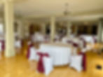 Indoor Wedding Reception with Burgundy Accents