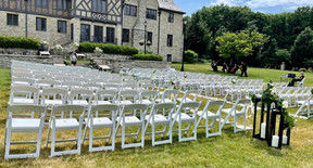 Summer Outdoor Wedding Ceremony with White Chairs