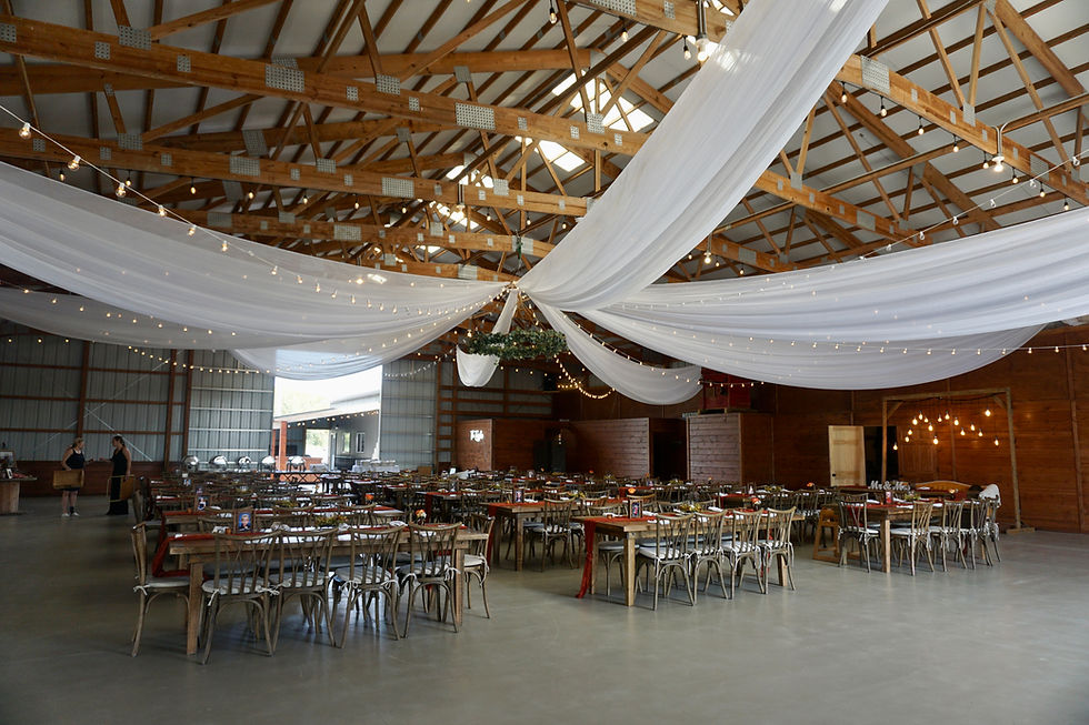 Barn Wedding Reception with Center Ceiling Draping with Bulb Lighting