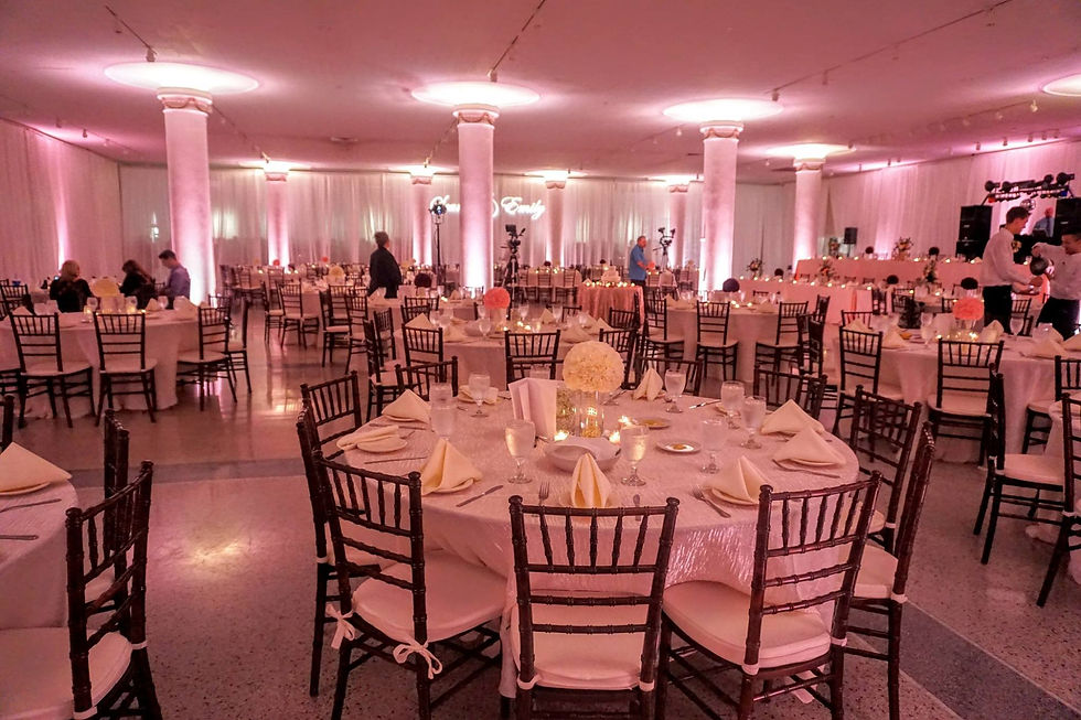 Indoor Wedding Reception with Pink Uplighting