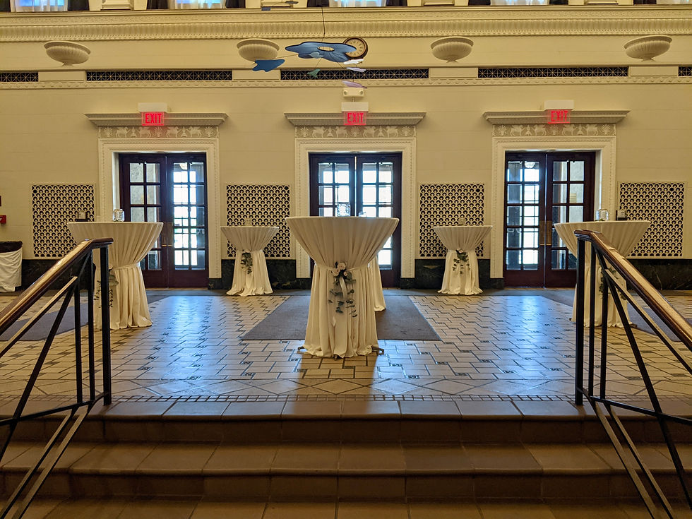Indoor Wedding Cocktail Hour Cocktail Tables with Linens