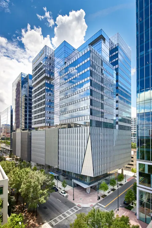 Anthem headquarters building featuring reflective glass panels and sharp geometric lines captured from a wide urban view.