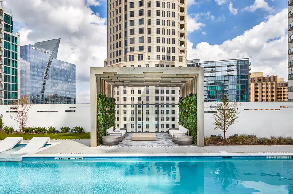 Rooftop pool and architectural lounge space at ICON Midtown, designed for luxury urban living and captured in commercial architecture photography.