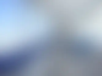 Interior shot of rounded glass and walls in Atlanta based Delta Sky Club