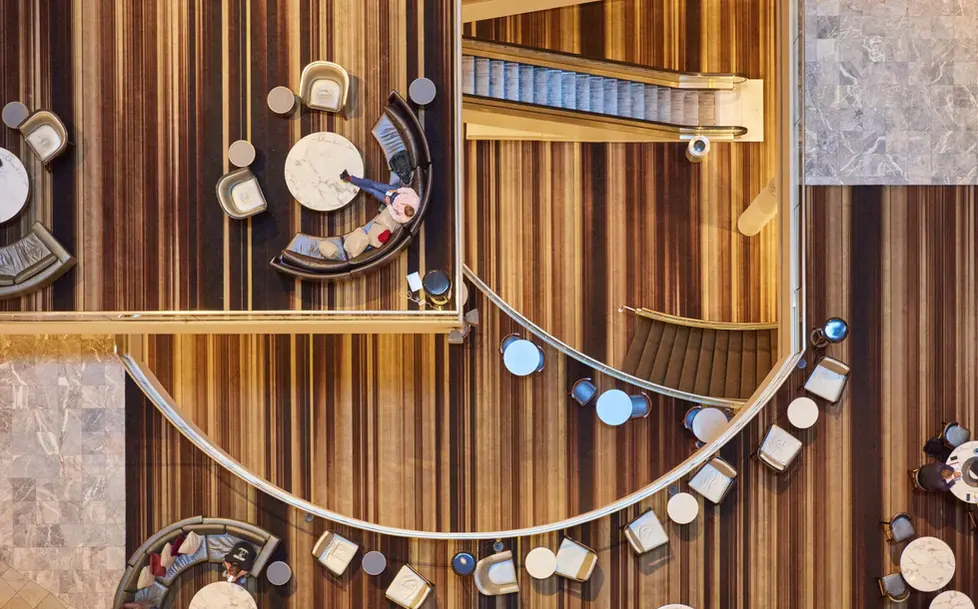 Cozy Marriott seating area with modern furnishings and warm lighting.