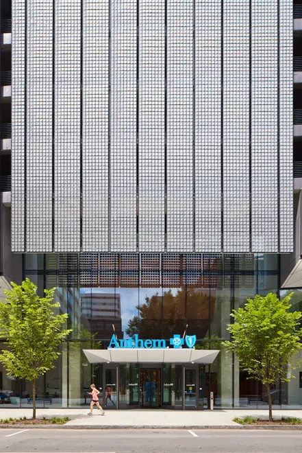 Street view of Anthem corporate building entrance with modern glass architecture and branded signage.
