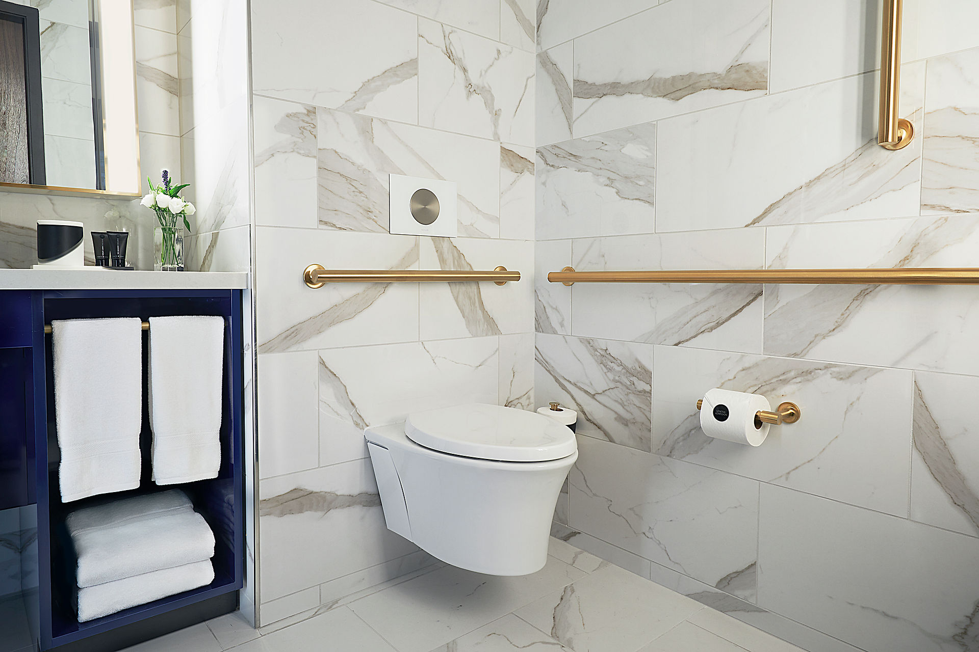 White Marble and Gold trim accents in the Toilet Room Bathroom at Hard Rock Hotel New York
