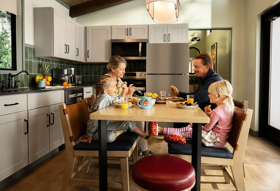 Family of 4 eating at the Disney Cabins at Fort Wilderness Resort