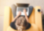 Woman running a search on a laptop