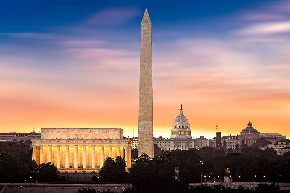 New dawn over Washington - with 3 iconic monuments illuminated at sunrise_ Lincoln Memoria