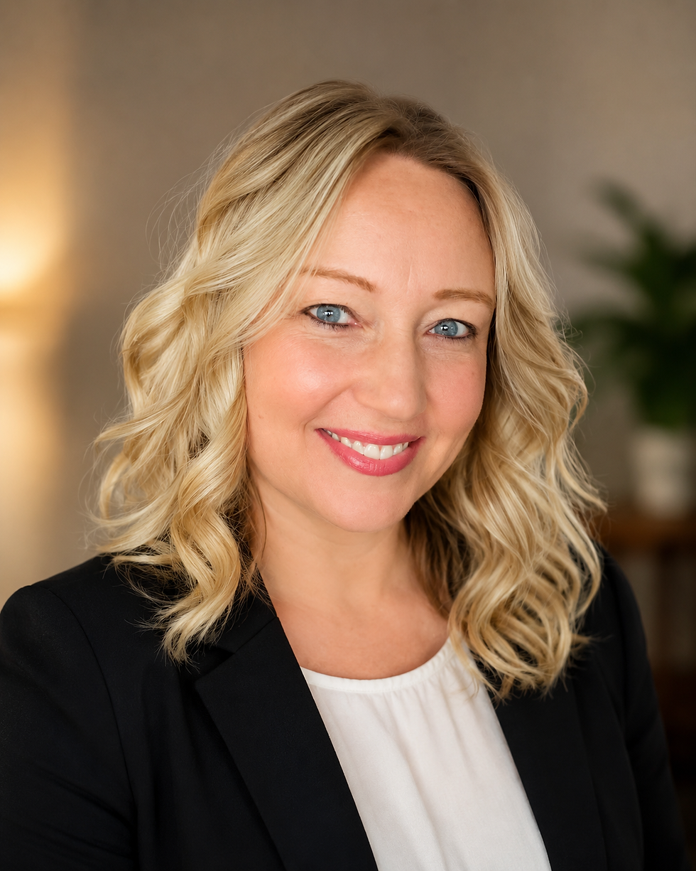 Portrait of Sara, a smiling woman with wavy blonde hair.