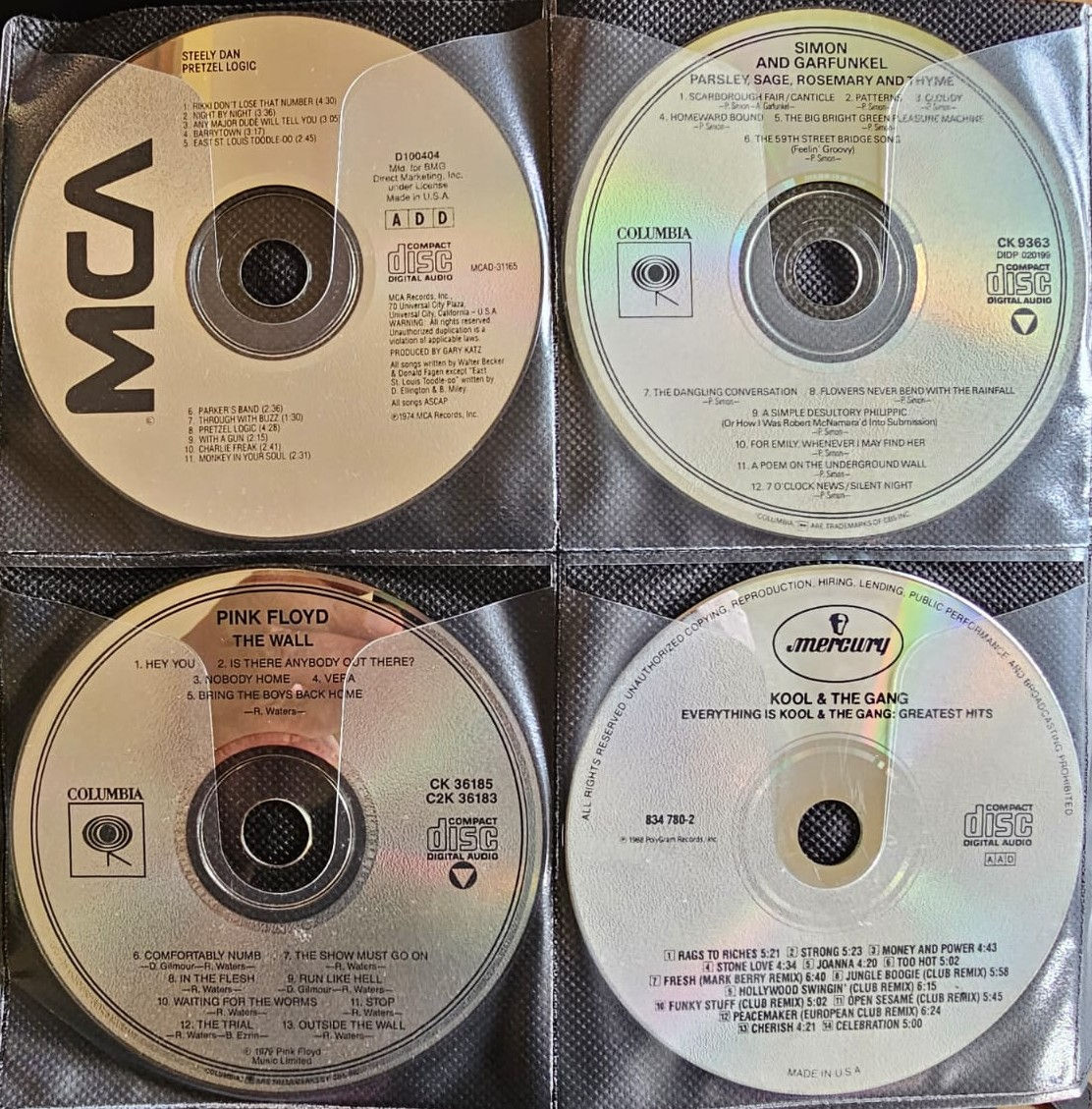 CDs Steely Dan! Simon & Garfunkel! Pink Floyd! Kool and the Gang!