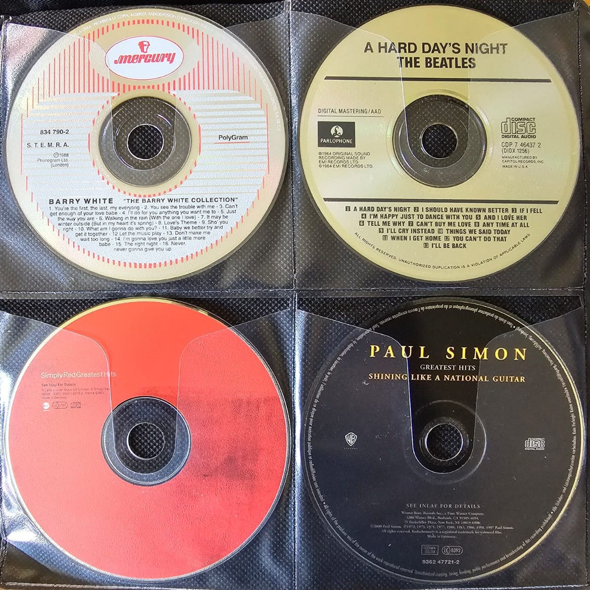 CDs Barry White! The Beatles! Simply Red! Paul Simon!