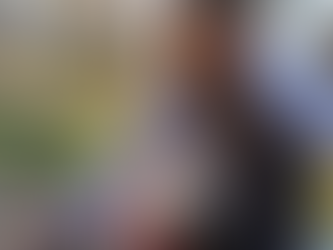 Daniela Udoff sitting outdoors with her dog in Central Park, reflecting on nervous system resilience and emotional recovery.