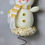 Thumbnail: Gold & Cream Snowman Tree Topper – Elegant Handmade Christmas Decor
