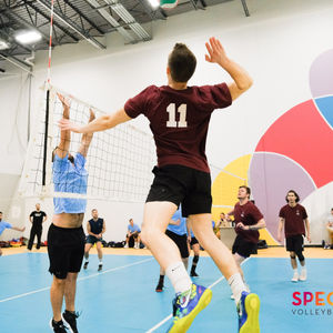 LGBTQ+ man playing volleyball in Alberta