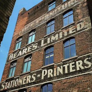 ghost sign for paper company 