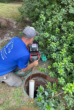 On Point Plumbing using a digital sewer camera and locating machine to identify a drain blockage for a Summerville homeowner.