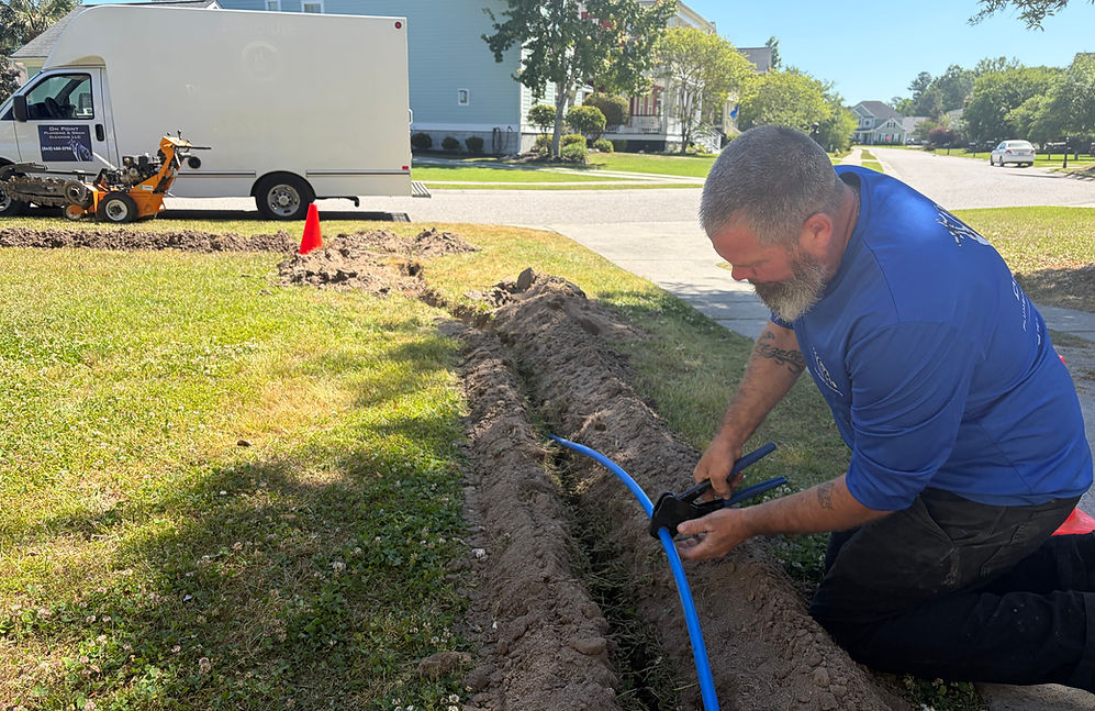 owner Robert Miller repairing and rerouting a residential sewer line to clear a major blockage for a Summerville homeowner.