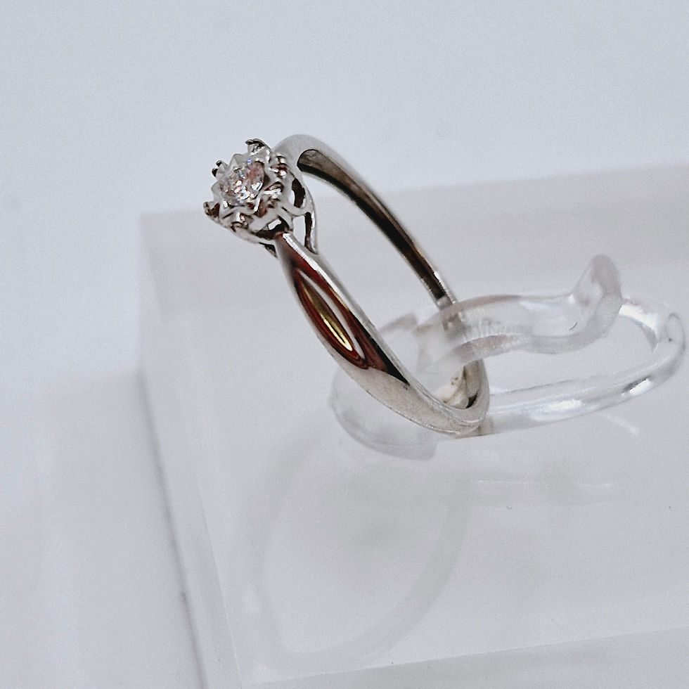 Thumbnail: 9ct White Gold Ring with a Diamond in a Star Setting