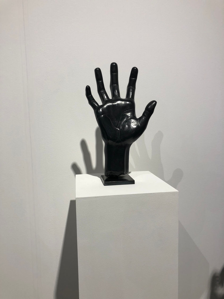 A hand for creativity, a hand for society and hands for peace