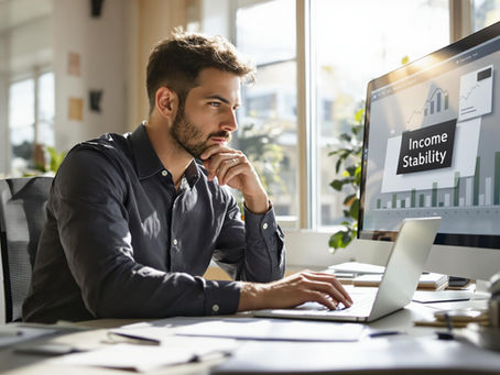 IT consultant reviewing income graphs highlighting strategies for financial stability