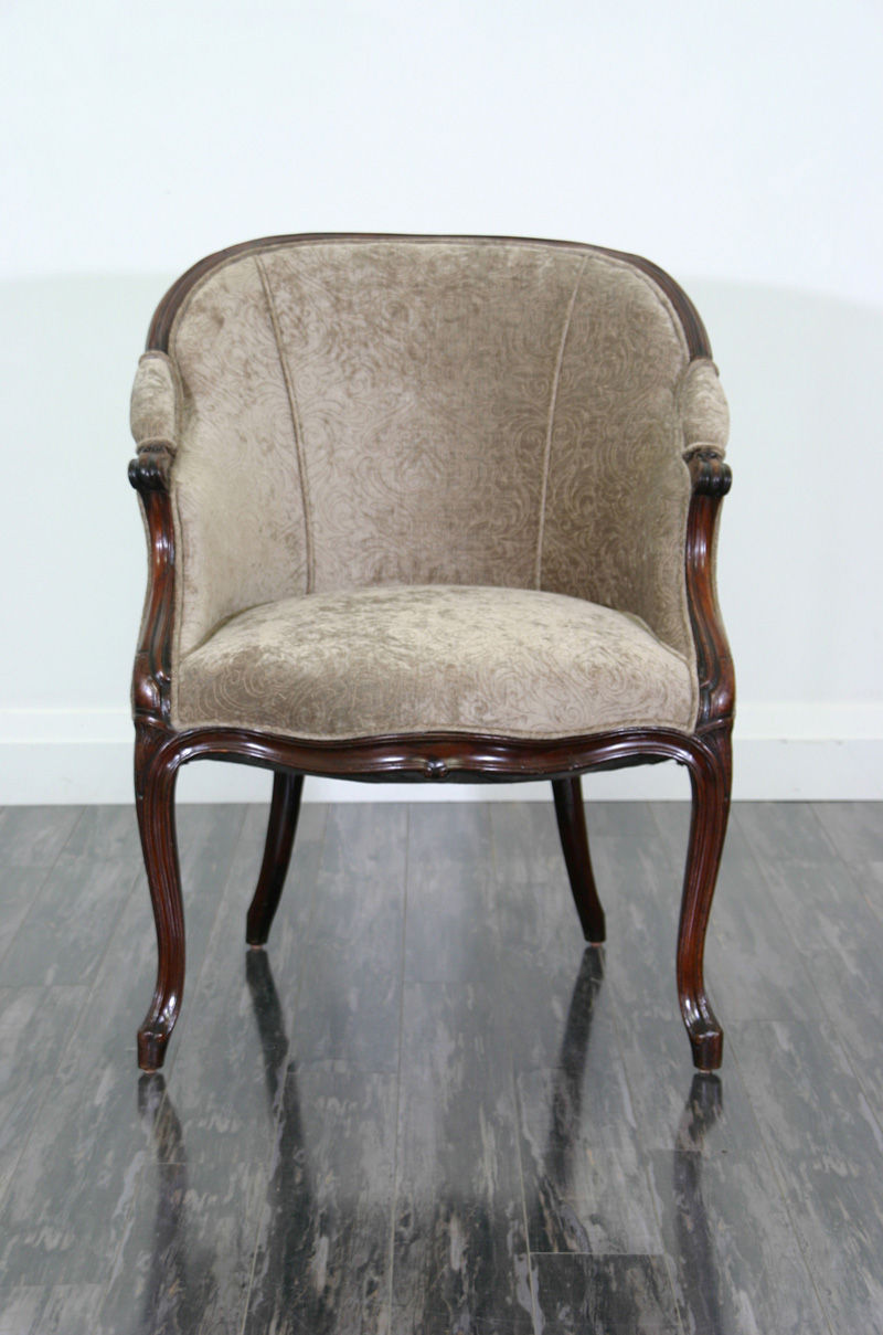 Thumbnail: An English Hepplewhite George III period carved mahogany tub chair, c1780