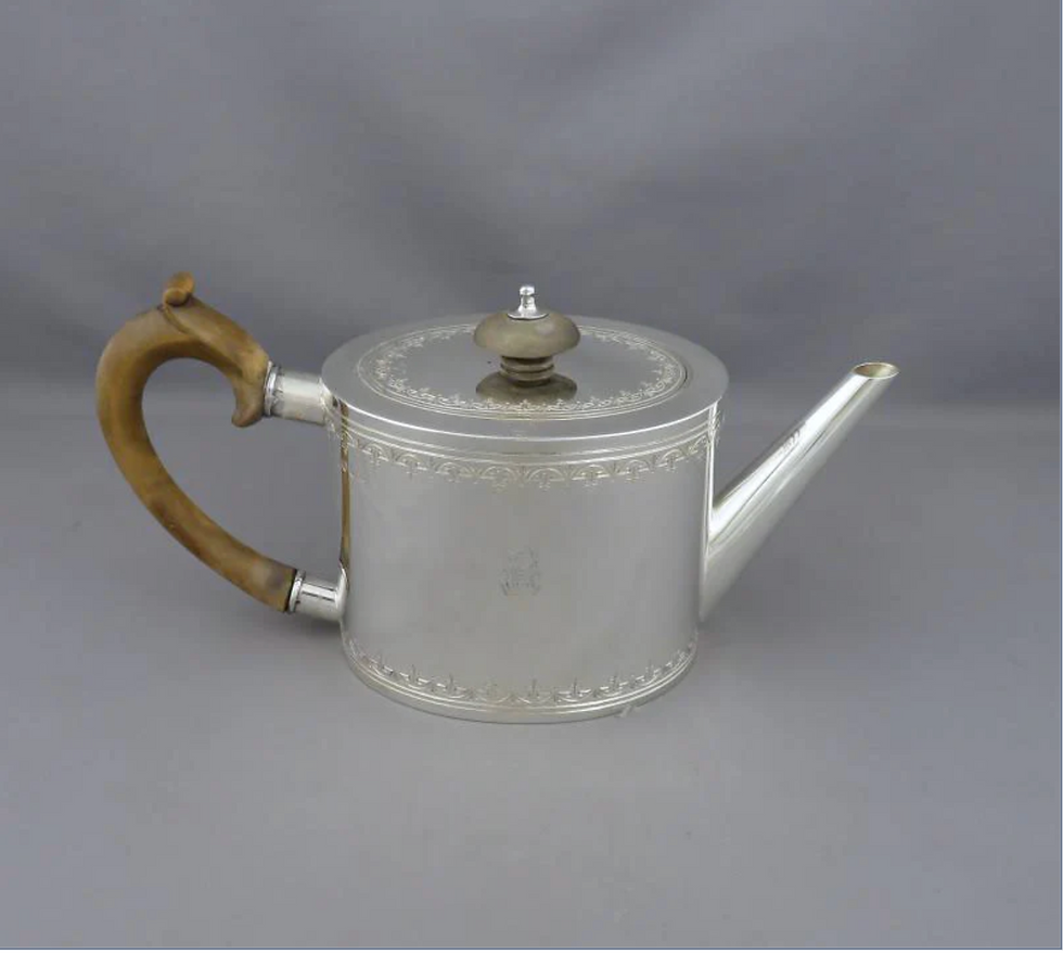 Thumbnail: A Victorian silver tea set with gilt interiors, Garrard II, London 1879 & 1885