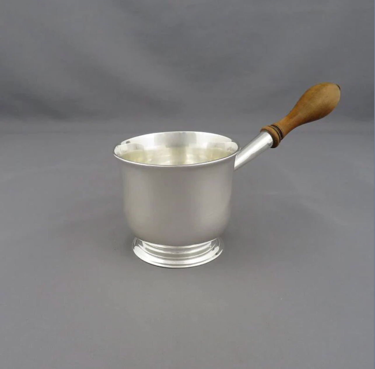 A George III sterling silver brandy warmer (saucepan) hallmarked London 1792