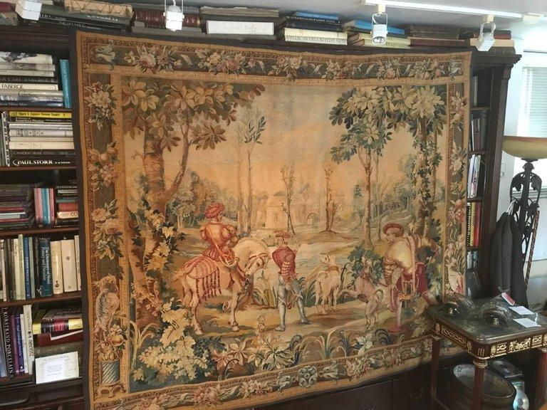 Thumbnail: A large Aubusson style tapestry, depicting a hunting party and castle landscape